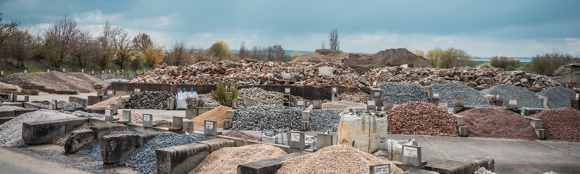 Schmitt-Bau-Bergtheim-Schuettgueter-Header